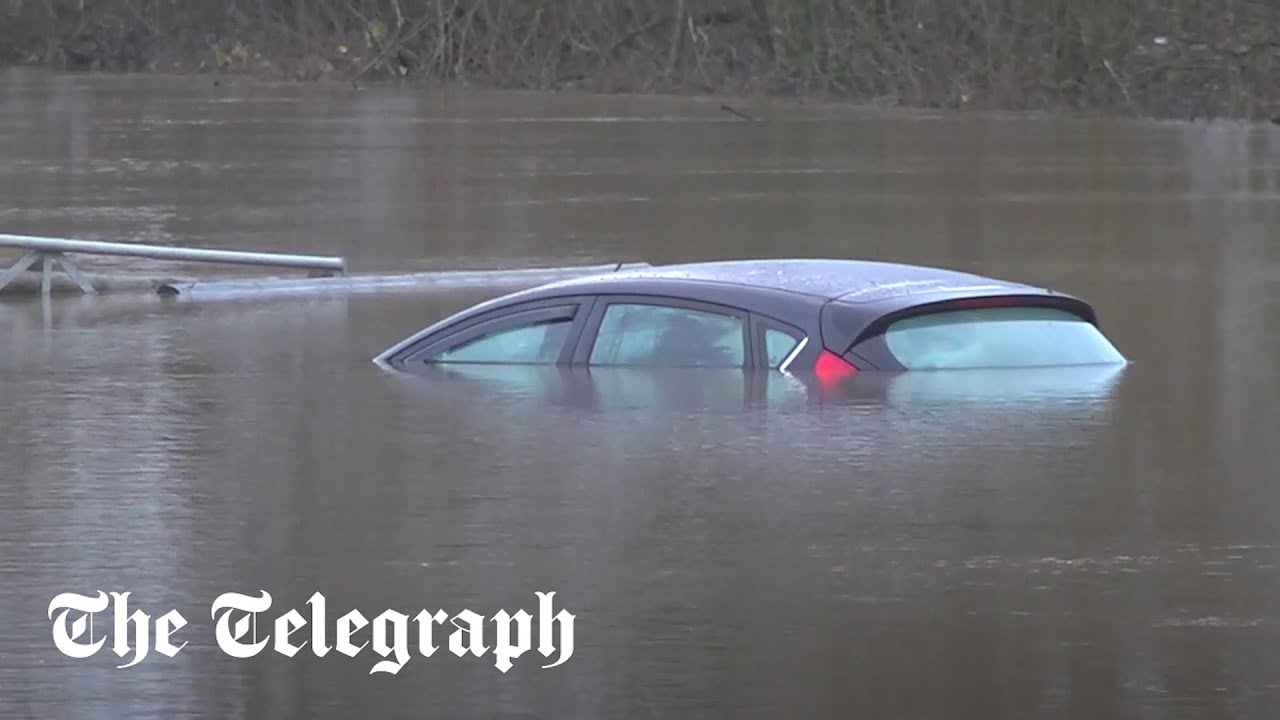 UK Weather: Flood warnings continue as cars, boats, and businesses are submerged by water