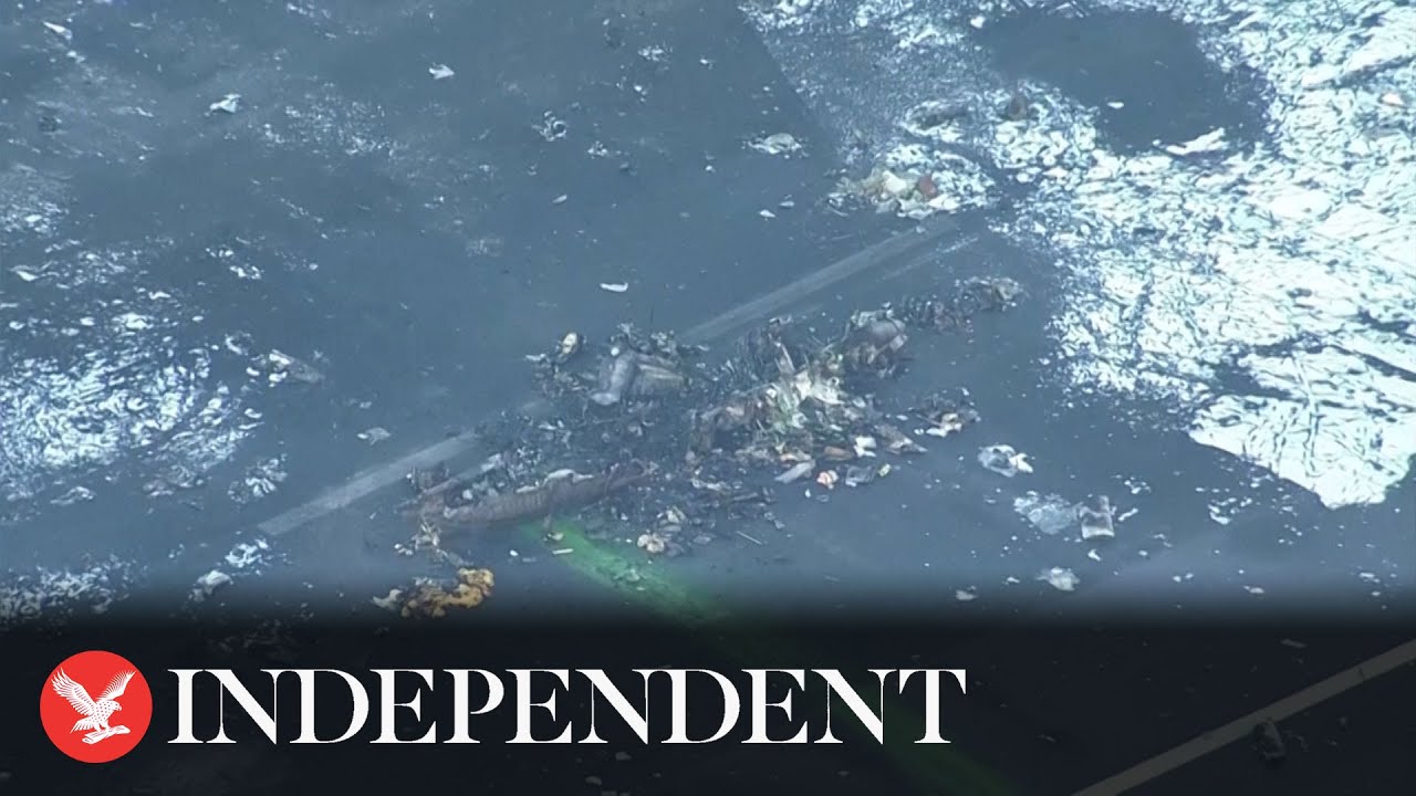 Aerial footage of Japan aircraft wreckage reveals extent of deadly plane fire