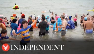 Watch: Hundreds brave icy waters for New Year’s Day dip