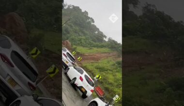 Shocking moment a landslide covers cars in north-west Colombia