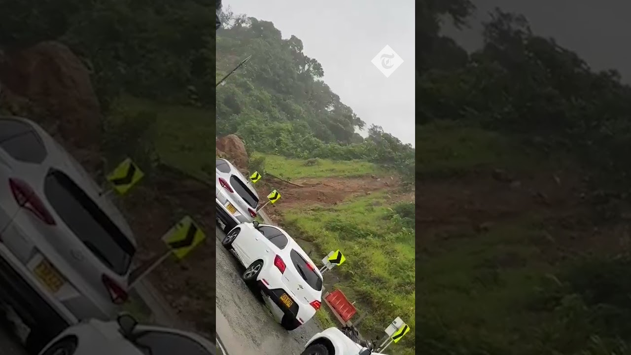 Shocking moment a landslide covers cars in north-west Colombia