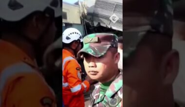 Indonesia train crash: rescuers battle to free survivors