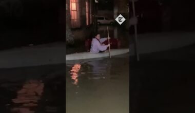 UK Weather: One woman seen kayaking on a flooded road in Hackney in London