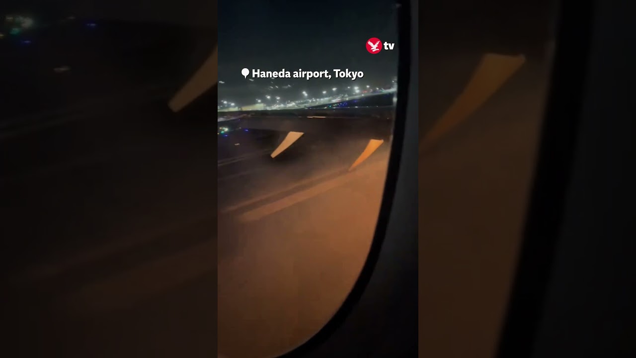 Moment burning passenger plane lands in Japan #news #shorts