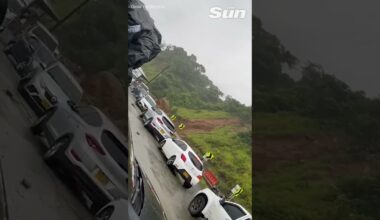 Moment deadly landslide crushes cars on Colombian road #shorts