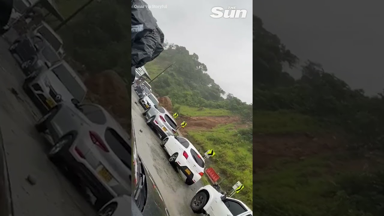 Moment deadly landslide crushes cars on Colombian road #shorts