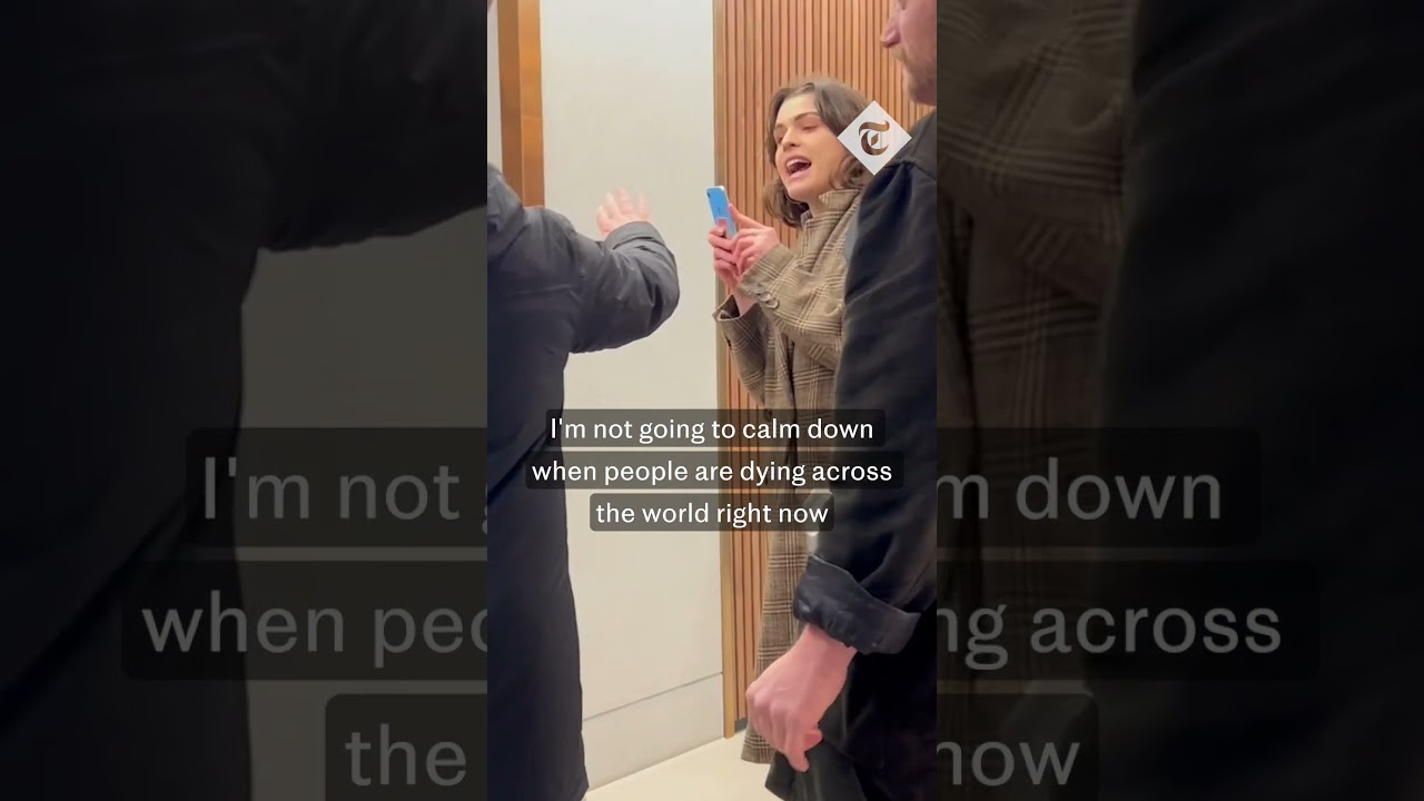 Priti Patel heckled by eco-activists in Westminster
