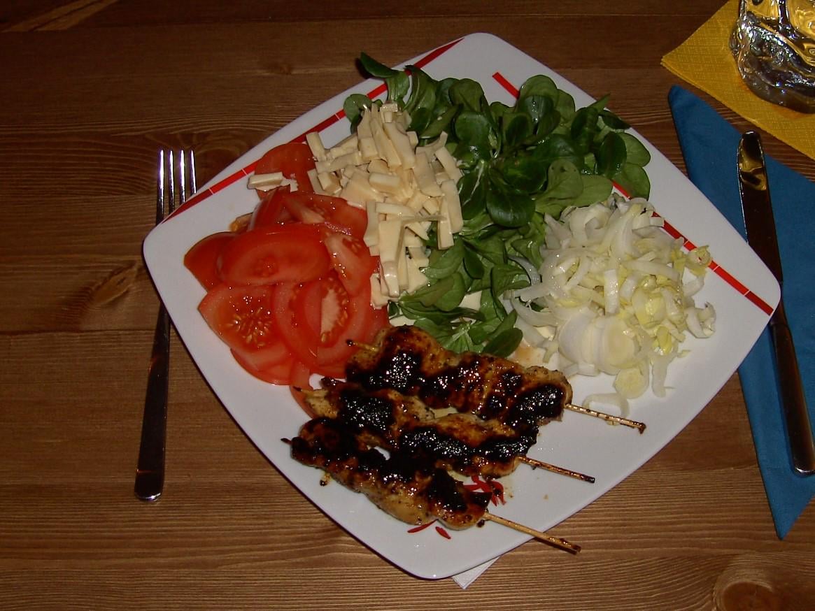 Freshly made satay skewers with a selection of salads, and some Emmental cheese for the fun of it