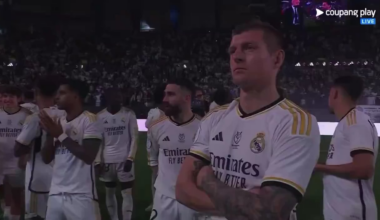 Camera spinning around Toni Kroos who is getting booed by the entire stadium in Saudi Arabia for his comments against the country while he seems unbothered and appreciates the audience.