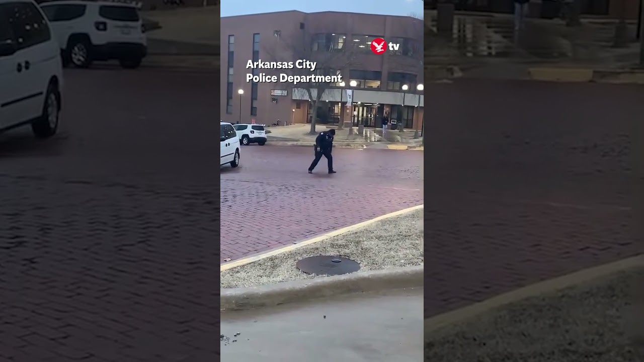 Policeman struggles to traverse icy road ❄️👮🏻‍♂️ #police #shorts