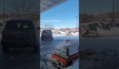 Driver rams skid loader into police car