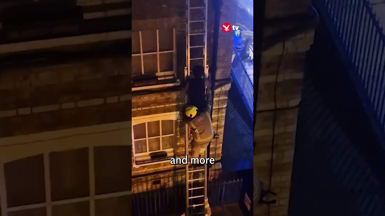 Man rescued from burning flat after e-bike catches fire #shorts