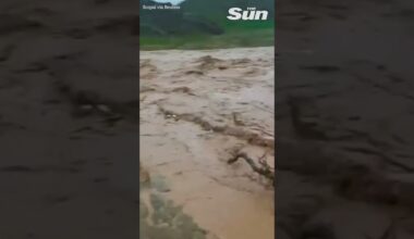 Iranian river BURSTS banks following heavy rains #shorts