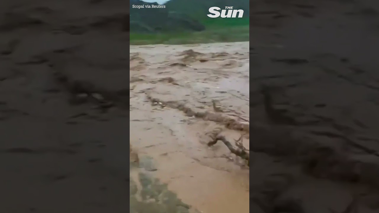 Iranian river BURSTS banks following heavy rains #shorts