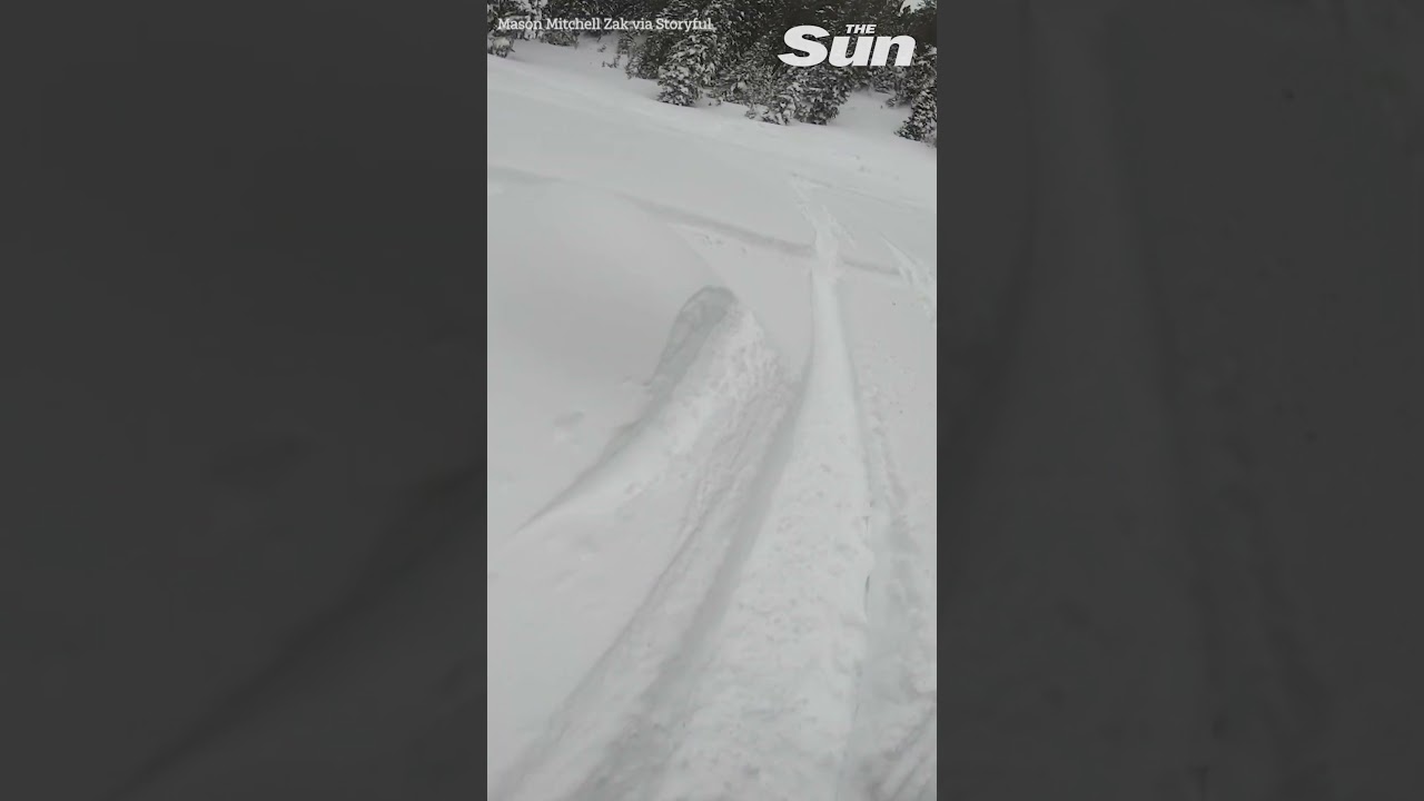 Dramatic POV video shows moment silent avalanche buries snowmobilers