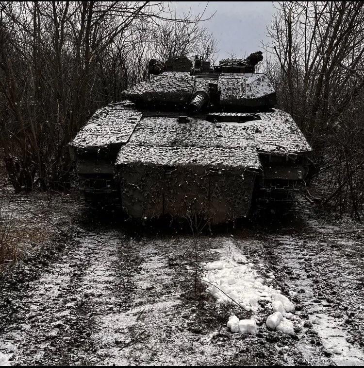 Swedish-supplied CV9040C infantry fighting vehicle (IFV) with the Barracuda camouflage system, of the Ukrainian Army - in the Luhansk Oblast, on the eastern front.