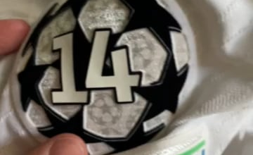 In November I bought a Real Madrid long sleeve shirt from the official store in Barcelona and today I noticed that the numbers on the champions league badge are starting to come off. Do you know how I can fix that?