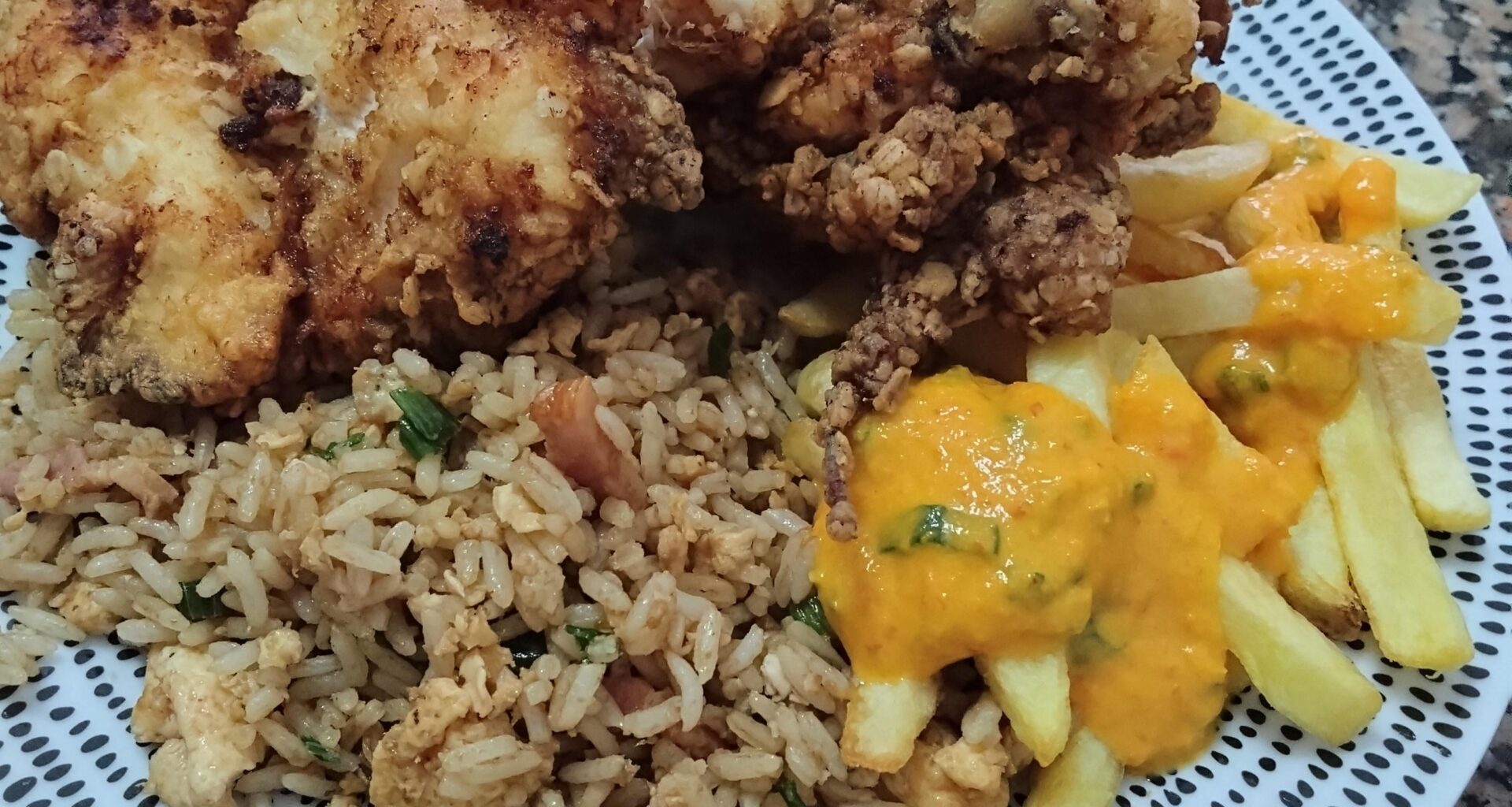 Broaster chicken + Chaufa rice + potatoes with ají sauce