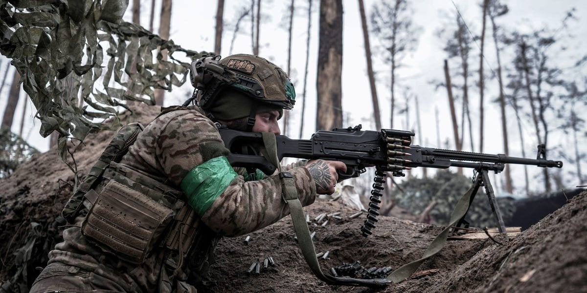 A video appears to show a lone Ukrainian soldier fending off 10 Russian soldiers in close-quarter trench battle