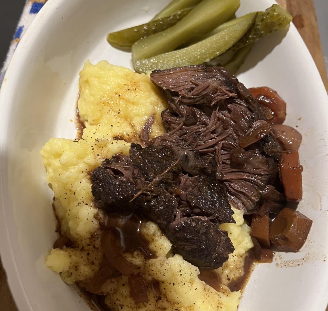Viel cheecks wine stew, mashed potatoes and pickles