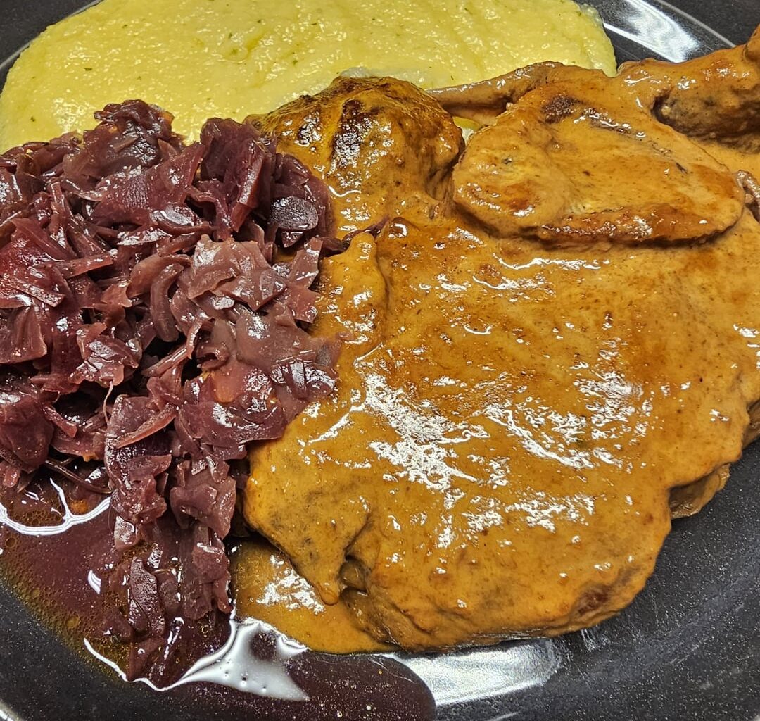 Ossobuco in a red wine and porcini mushroom sauce, with polenta and red cabbage