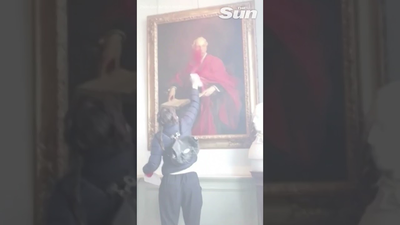 Pro-palestinian protestor SLASHES painting of British author of Jewish homeland declaration