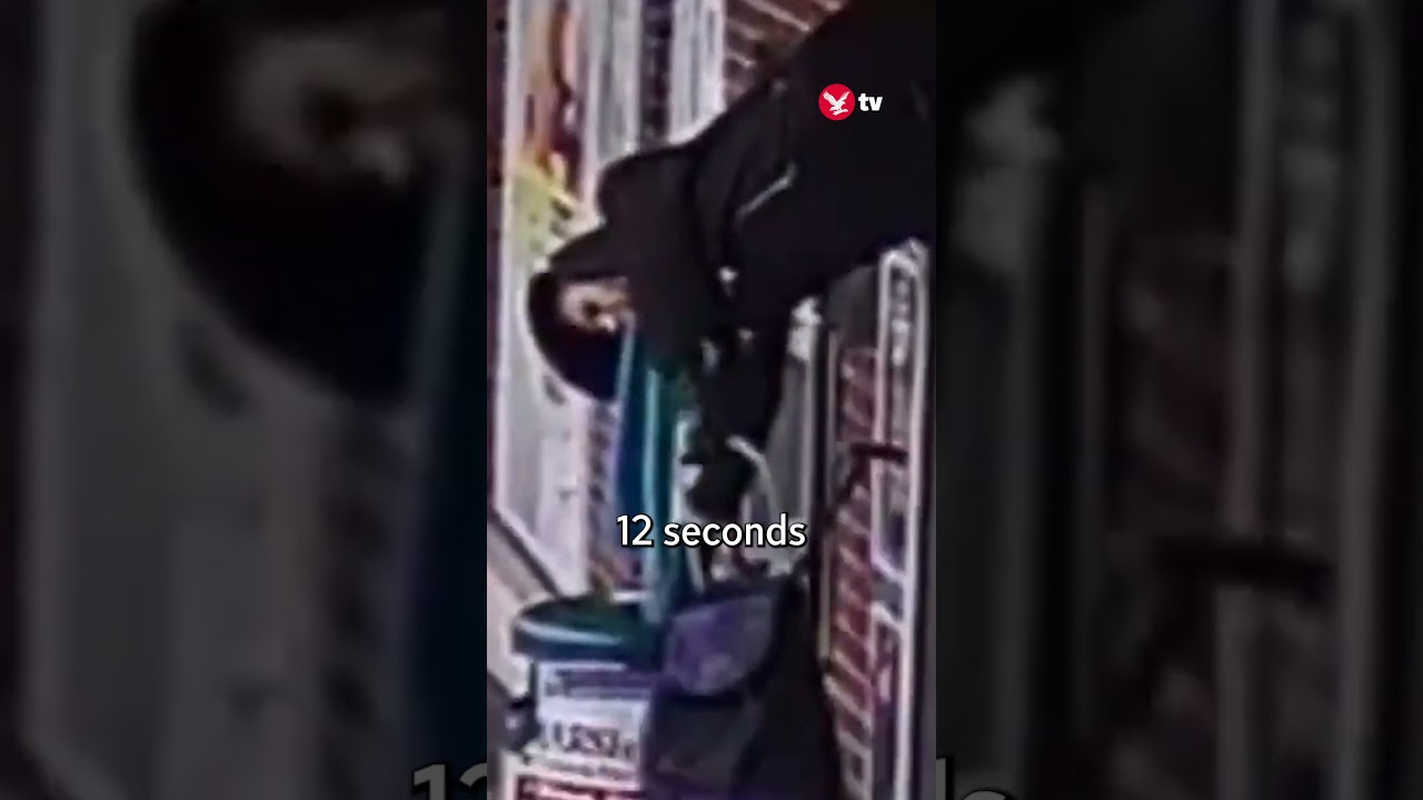 Shop shutters lift woman into air (Credit: Kennedy News and Media) #shopper #shorts