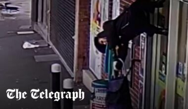 Shopper lifted 6ft into the air after jacket caught on opening shutters
