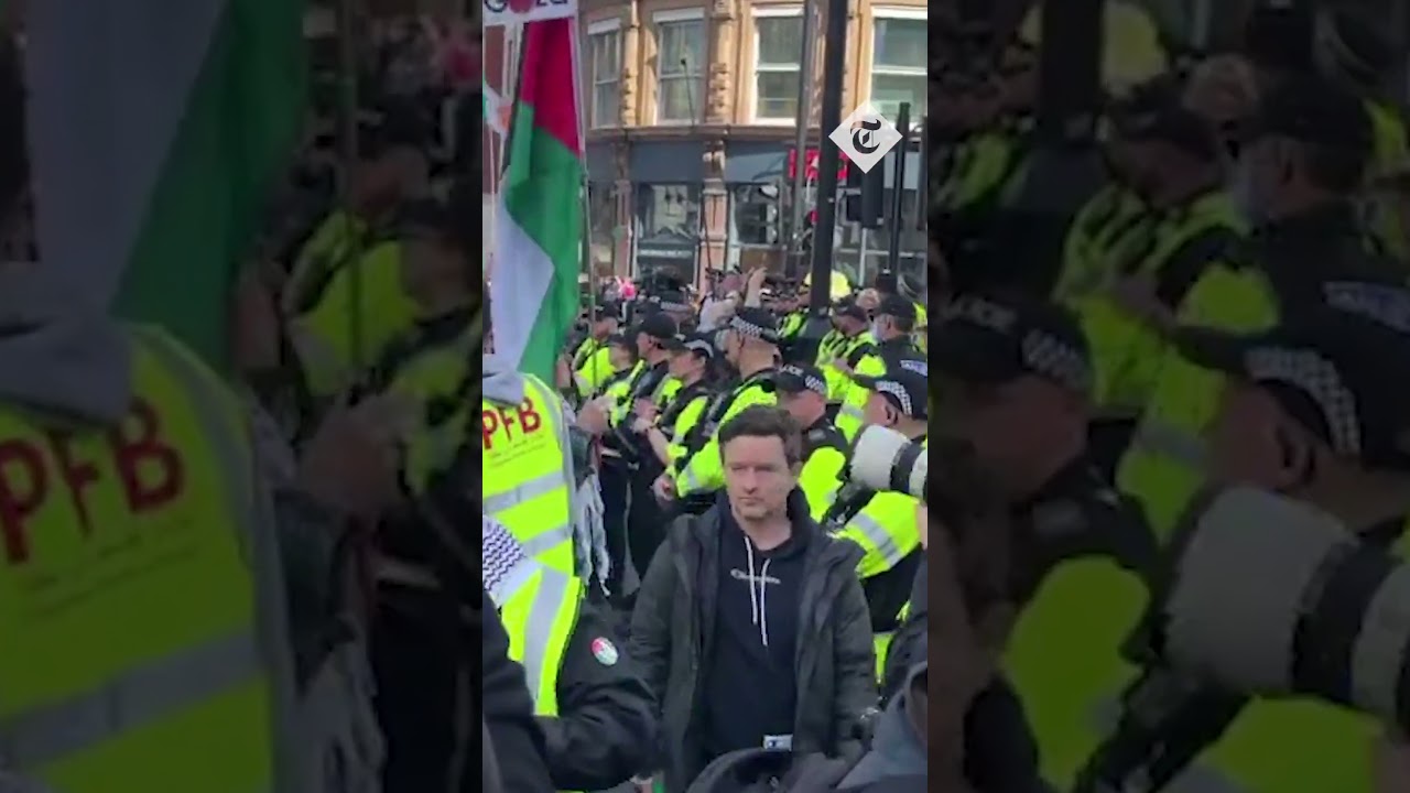 Police stand between pro-Palestinian and counter protesters in London