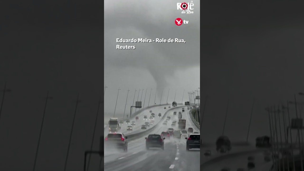 Large waterspout looms over Lisbon bridge #shorts #weather #storm