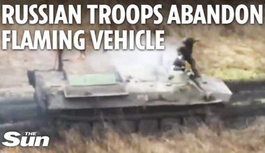 Russian soldier's uniform ripped off before he leaps from burning tank hit by kamikaze drone