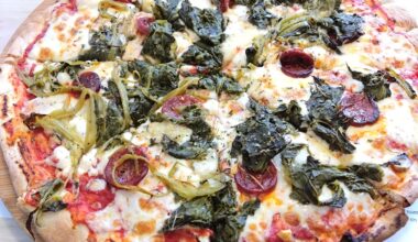 Galician style pizza with San Simón Da Costa cheese, chorizo and rapini