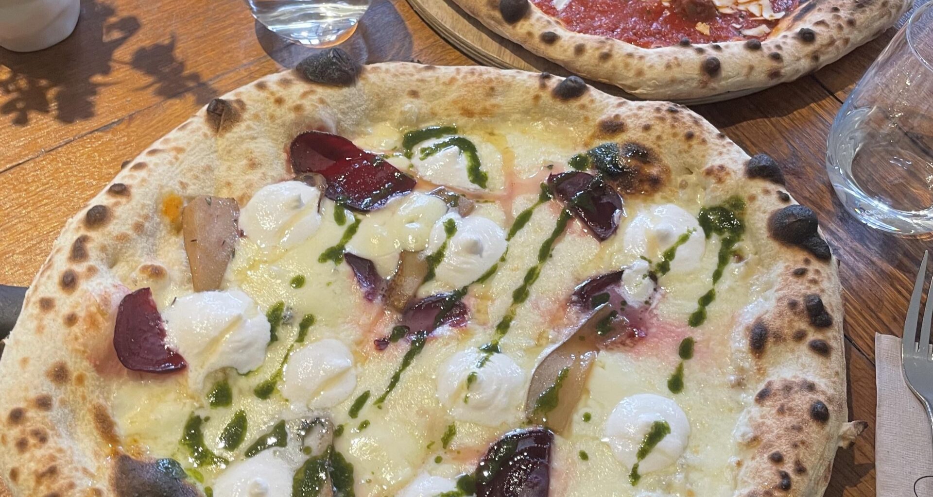 White Pizza with Goat Cheese, Thyme, Red Beets, Pears, and Honey