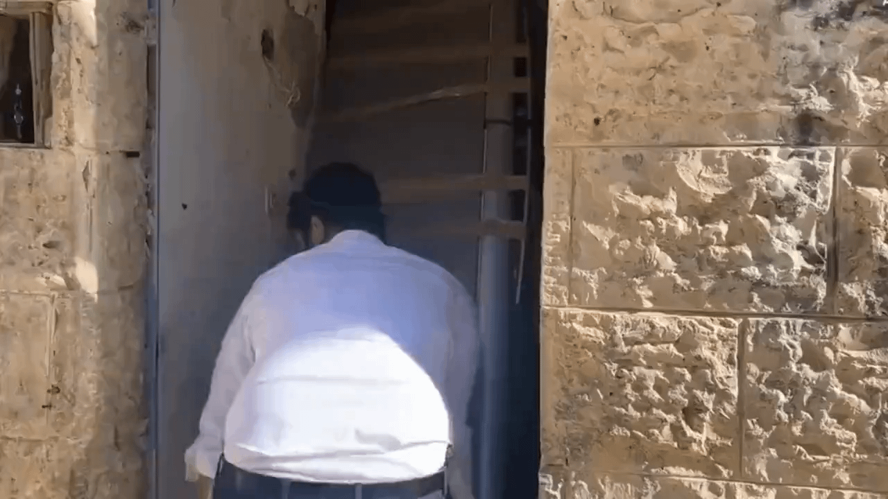 settler stealing a Palestinian’s home, and tried to hand the man his own milk