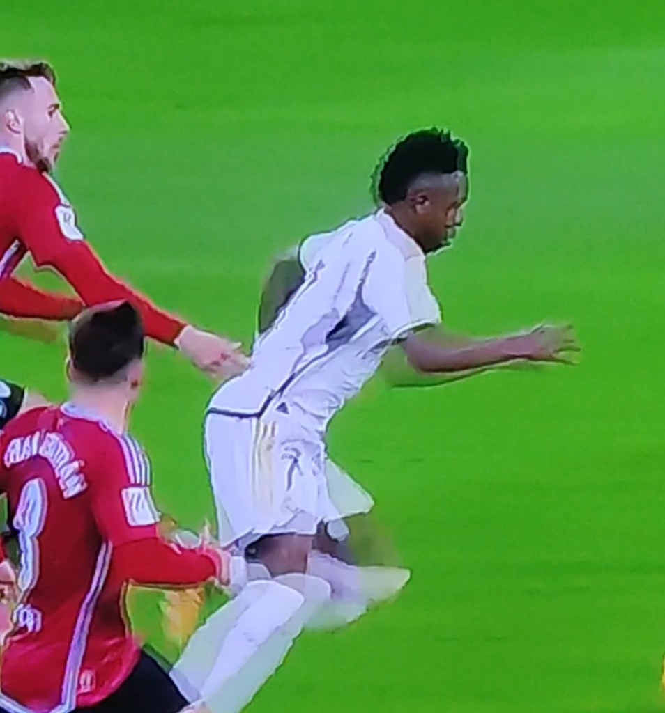 Vini needs to work on his tember,  that dude is an ***hole but its just a tactical foul.