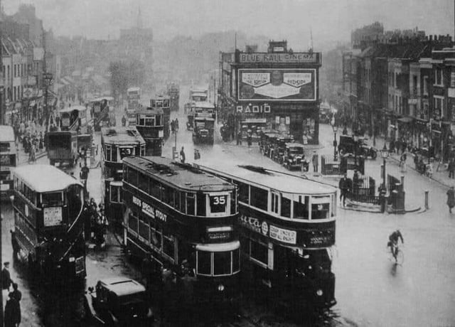 9 pics - Islington High St 1934; Portobello Rd 1950; Brixton 1897; Old Dick 1910; Empire Day 1950; Moorgate 1936; Acton shuttle 1950s; Hyde Pk 1951; Tower Br 1913.