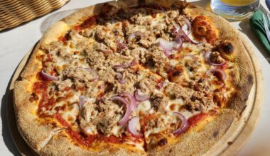 Pizza al tonno (tuna pizza), at a Balkan restaurant in Singen am Hohentwiel, Germany