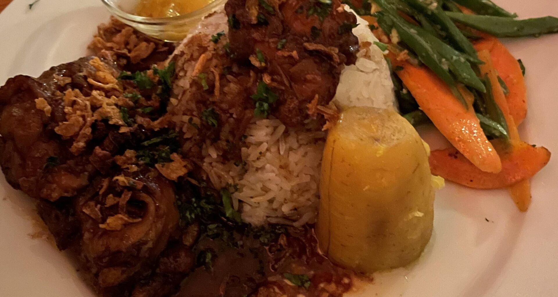Surinamese chicken with rice, plantain, and vegetables