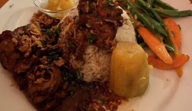 Surinamese chicken with rice, plantain, and vegetables