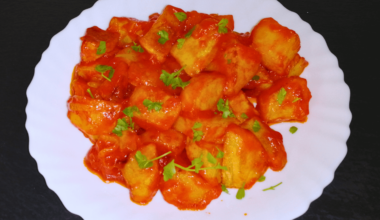 Fried Potatoes with a Tasty Tomato Sauce Recipe