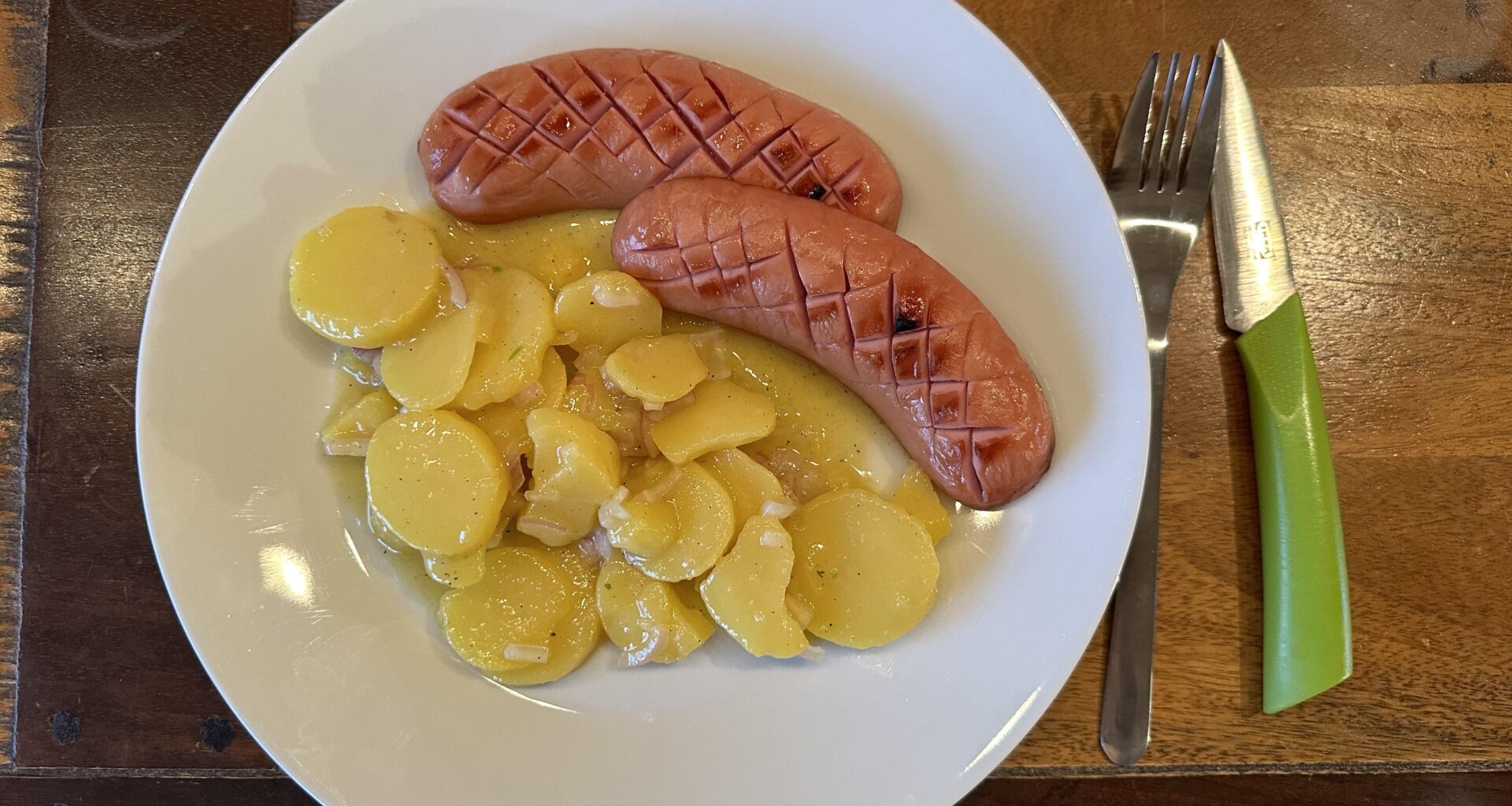 Grilled Knacker with potato salad