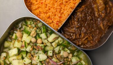 Chicken with mole, red rice and salad (brown lentils, chickpeas, red onions, evoo, parsley and vinegar)