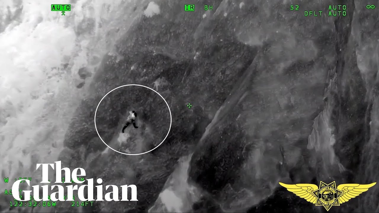 Man rescued while clinging on to cliff in California