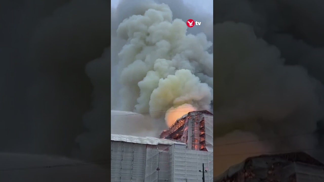 180ft burning spire collapses in Copenhagen #news #shorts