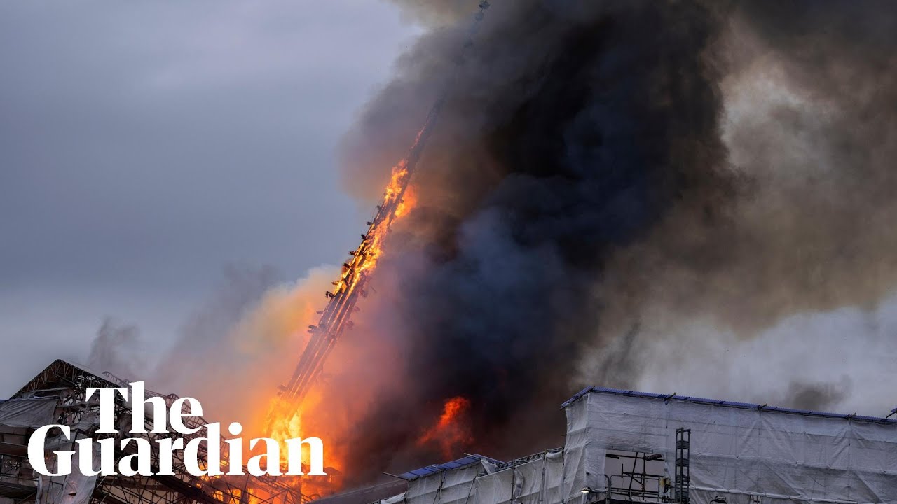 Moment spire collapses at Copenhagen's old stock exchange