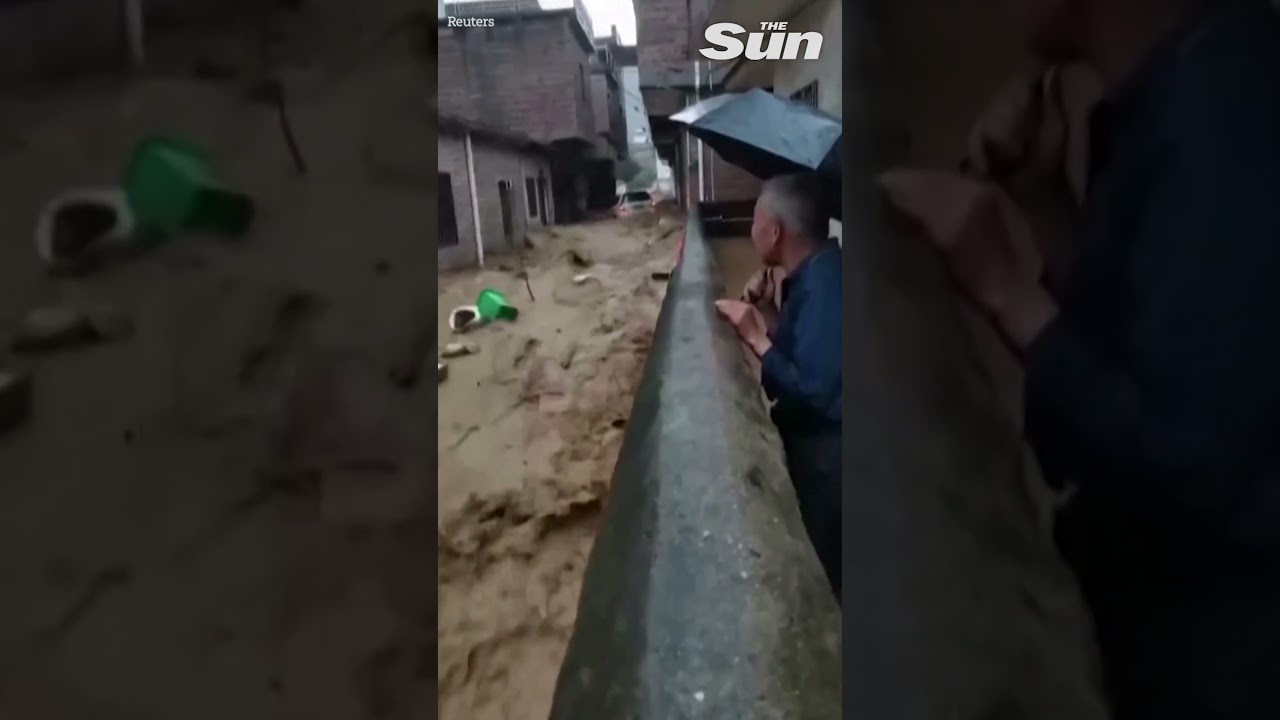 Dramatic moment CAR swept away in seconds during flash flood in China