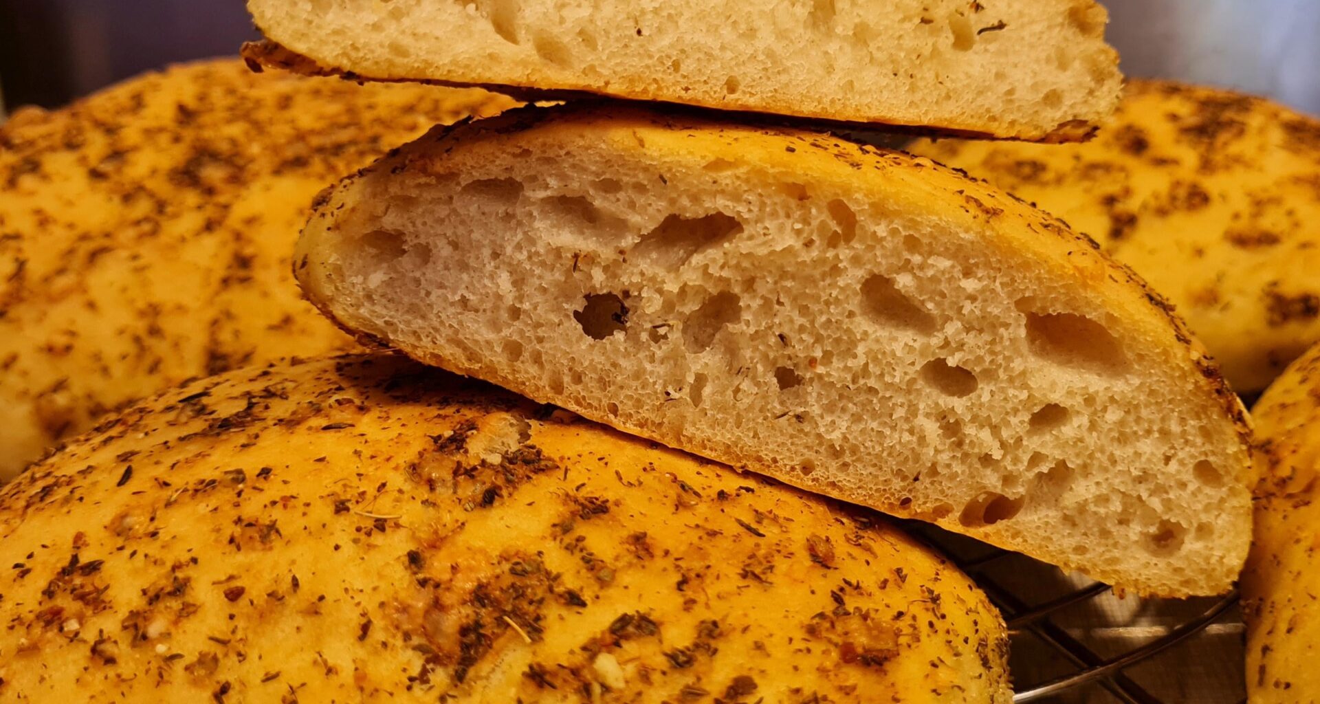 Ready for BBQ: Mediterranean bread with olive oil plus herbs and parmesan topping