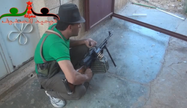 Sharp dressed FSA fighter enthusiastically engages with SAA forces during clashes in Tafas - 9/29/2013