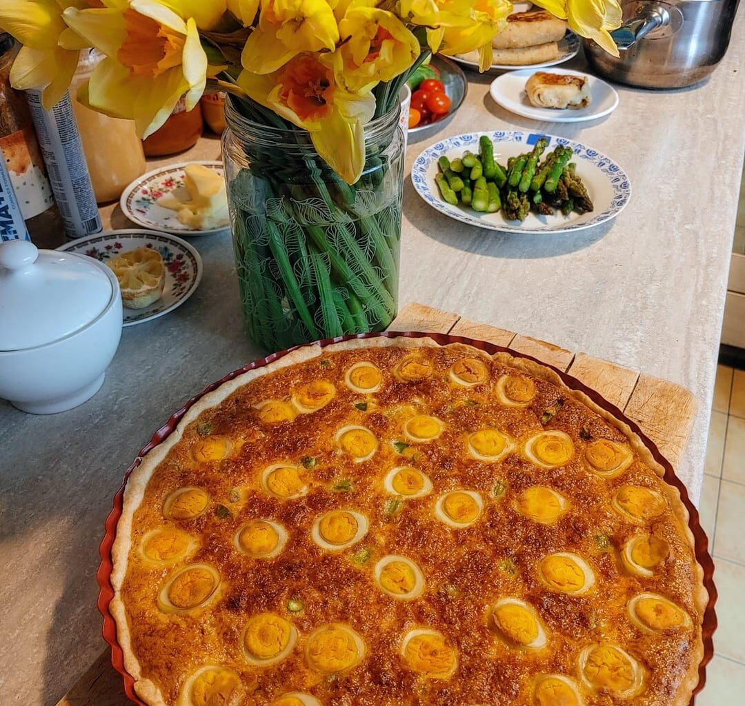The tart with quail eggs my mom baked for our Easter Breakfast, plus my sister's pistachios cheesecake.