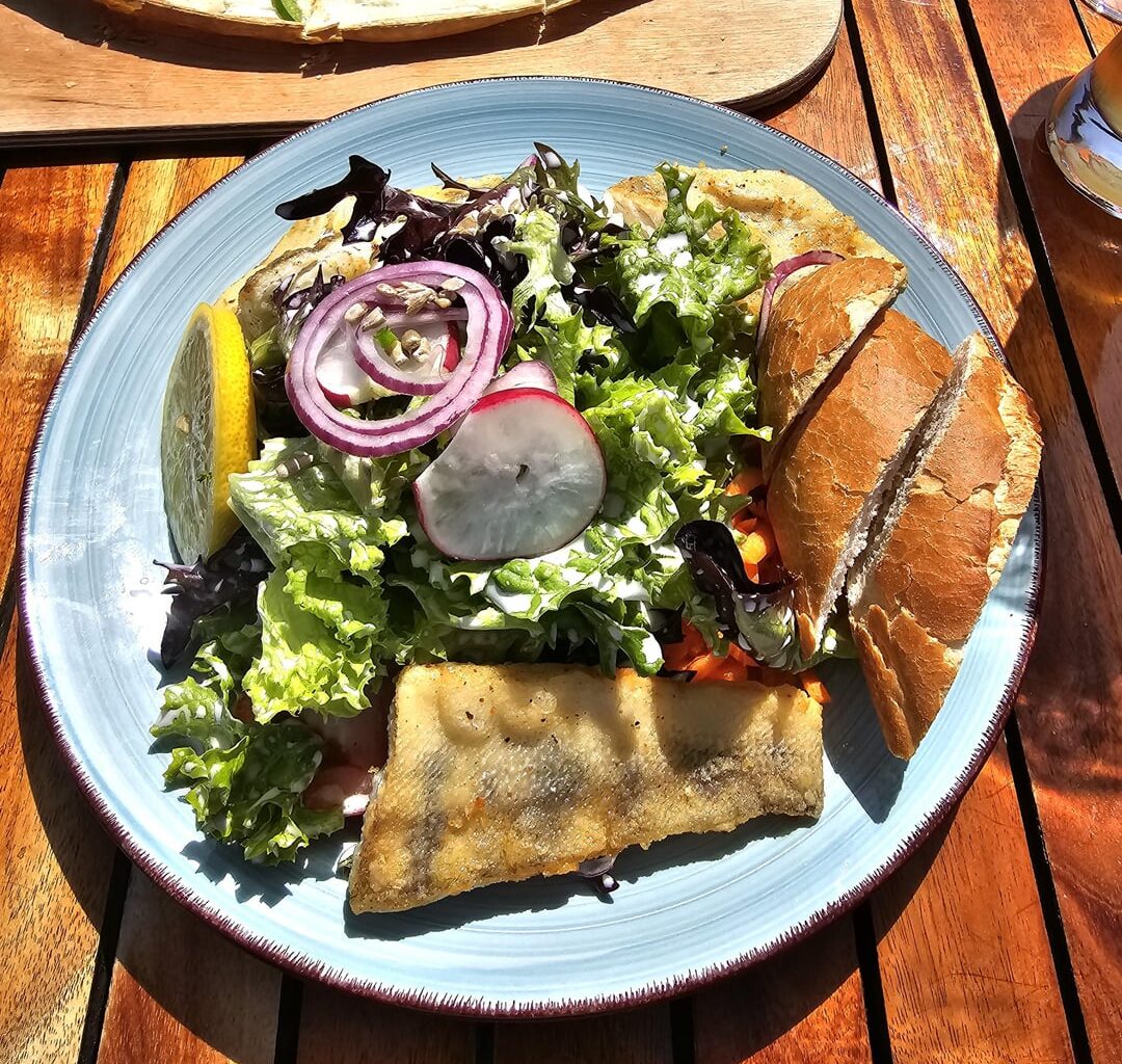 Zander, salad, bread and beer on the shores of Lake Constance, Germany